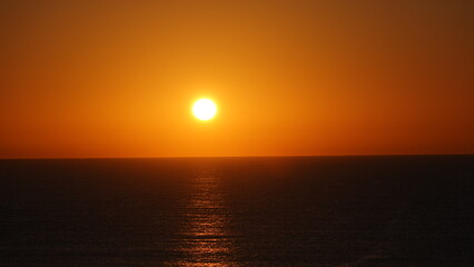 Sunset. Sunrise. Golden waves.