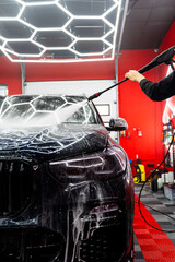 Car detailing foam application envelops the entire body for effective dirt removal and a spotless...