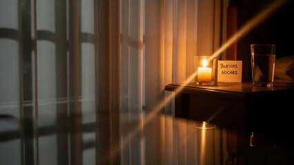 Cozy Spanish good night scene with candle, water, and soft light for peaceful bedtime moments in a relaxing, calm, quiet, tranquil, serene bedroom
