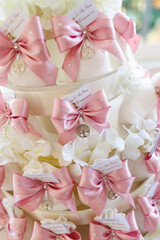 flower, gift, celebration, communion, party favor, sugared-almond, party, sweet, bow, almond, wedding, comfit, confection, sugar, background, ribbon, baptism, religion, colours, event, decoration, chi