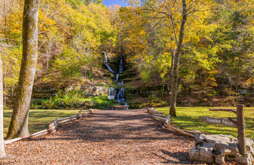 Sunny view of the beautiful autumn landscape of Thunder Falls in Dogwood Canyon Nature Park
