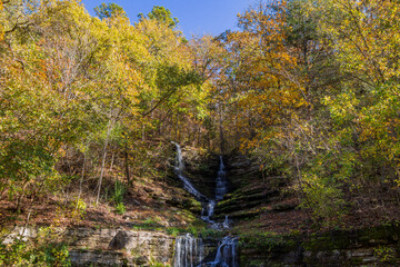 Sunny view of the beautiful autumn landscape of Thunder Falls in Dogwood Canyon Nature Park
