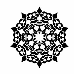 Black and white mandala with bold symmetrical geometric details forming a strong ornamental circular design.