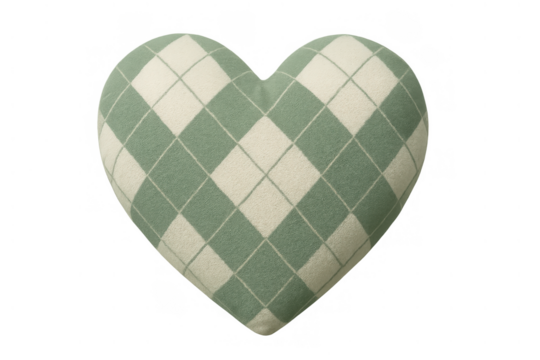 Heart shaped pillow with argyle pattern in green and white color for love, comfort, and home decor concept