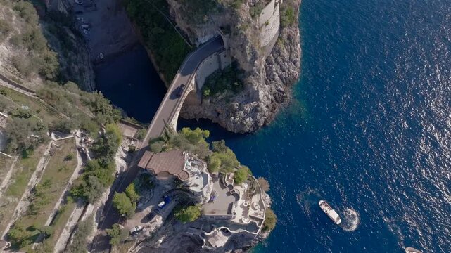 Aerial Shot of Fiordo di Furore, Fjord of Furore. Azure Water, Cliffs, Big Canyon, famous bridge in Amalfi coast, Italy