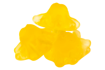 pile Yellow Giant Squid Shaped Jelly Candy on White Background