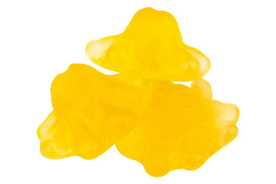 pile Yellow Giant Squid Shaped Jelly Candy on White Background
