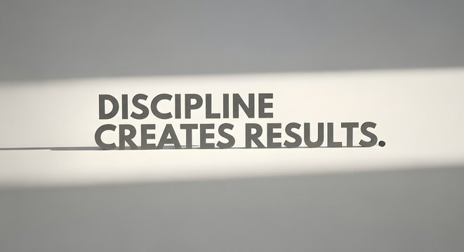 A motivational quote displayed on a wall that emphasizes the importance of discipline in achieving success and results - Powered by Adobe