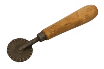 Vintage pasta cutter with a wooden handle and fluted metal wheel, a traditional kitchen tool for making ravioli and pastries