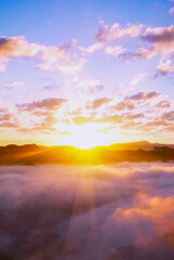 Vertical Horizon Golden sky sunrise dramatic beautiful landscape view. Dawn sky gold dusk time cloudscape with sunlight. Vertical Dramatic sunset golden red sky scenic landscape sunrise dawn heaven