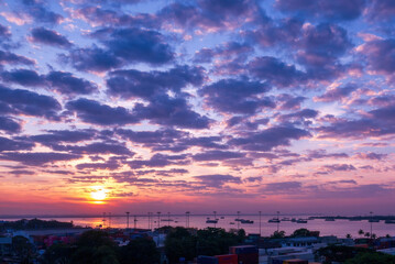 Romantic landscape sunset foggy mountain in evening twilight. Beautiful landscape foggy hills twilight time. Beautiful Purple sky sunrise dramatic landscape mountain. Dawn sky dusk time cloudscape