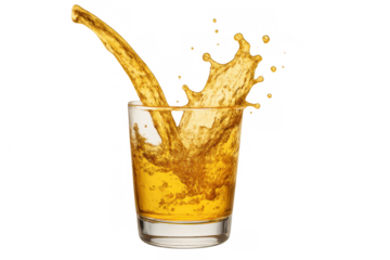 Orange liquid splashing out of a glass, creating a dynamic crown effect and drops of beverage in motion