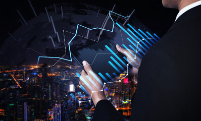 A businessman dressed in a suit analyzes various data trends with a digital graph overlay, set against a vibrant cityscape illuminated at night. Scalp
