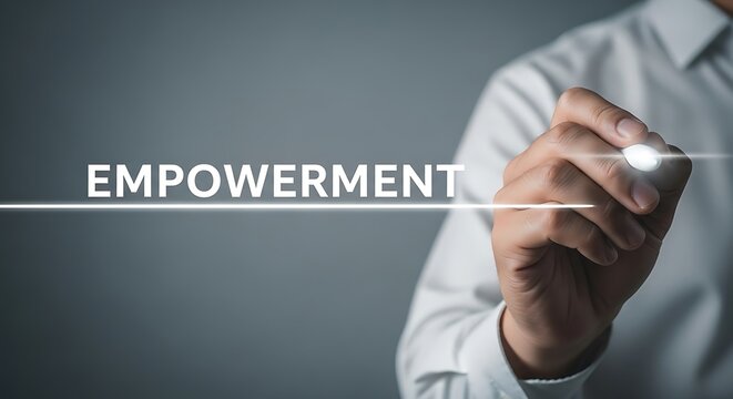 Empowerment concept with a person drawing a line under the word empowerment