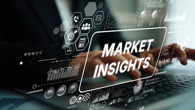 Hands of business professional examining market insights with digital analysis and graphs representing data visualization trends. Asymptotic smart data analytic.