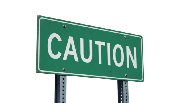 Clear CAUTION road sign demanding attention for safety