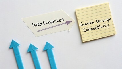 Data Expansion Concept with Arrows and Sticky Note Highlighting Growth through Connectivity for Business Strategy
