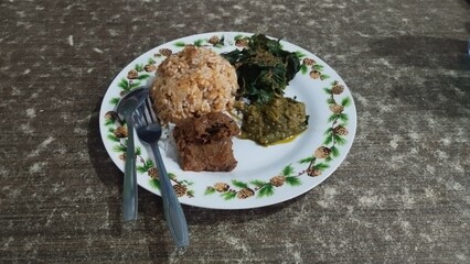 Nasi Rendang Served in the plate