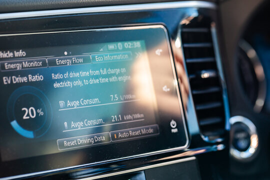 battery energy and petrol consumption data screen on hybrid vehicle