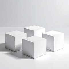 Four white cubes on a neutral surface, simple presentation