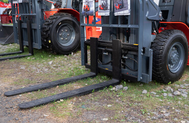 Industrial forklift with durable tires and metal forks. © Svetlana Verbitskaya