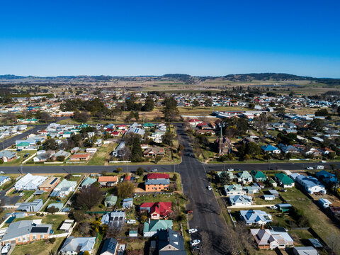 sunlit townscape of Glen Innes on late winter morning with houses lining intersecting streets