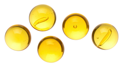 Five yellow, transparent gel capsules against a dark backdrop