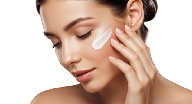 Young woman applying facial cream or lotion with eyes closed in skincare routine isolated on transparent background