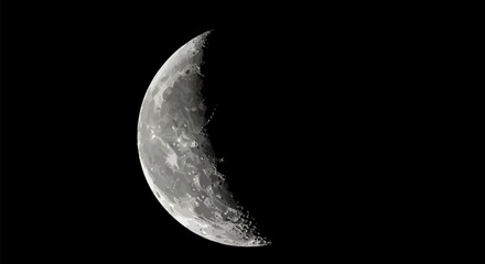 A detailed illustration shows the crescent moon against a stark black background. The moon's textured surface reveals craters, varying shades of gray, and its characteristic curved shape