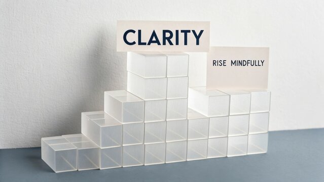 Inspirational Reminder of Clarity and Mindfulness with Transparent Building Blocks on a Simple Background