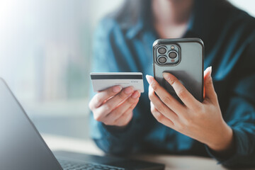 credit, card, payment, ecommerce, transaction, Close-up of a woman using a smartphone and holding a credit card for online payment, symbolizing digital banking, finance, and ecommerce security.