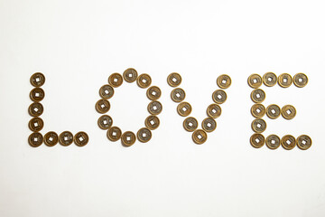 Valentine's Day Concept with Asian Lucky Coins Forming LOVE