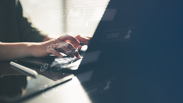chat, support, live, assistance, messaging, conversation, Hands typing on laptop with digital chat icons overlay, representing live customer support, online assistance, and instant messaging service.