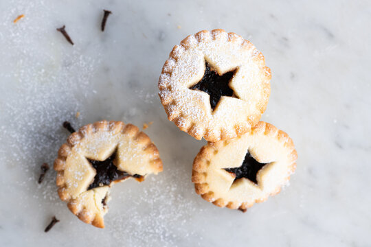 three baked fruit mince pies, a traditional christmas food