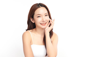 A beautiful young Asian woman with clean, fresh skin against a white background. Skincare, facial treatment, cosmetology, beauty, and spa. An elegant portrait of an Asian woman.