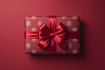 Elegant red gift box, golden snowflake pattern, shiny satin bow on solid red