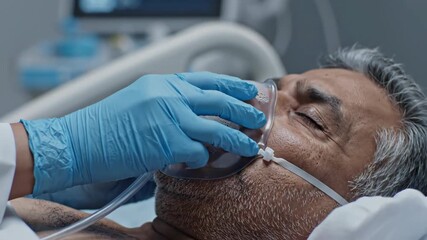 Elderly Patient Receives Oxygen Therapy in Hospital Intensive Care Unit. - Powered by Adobe