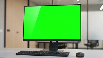 Chroma Key Display with young man working at computer green mock up screen in office close desktop monitor distortion, overlay, glitch, static noise, scan lines on black background, 4k animated video - Powered by Adobe