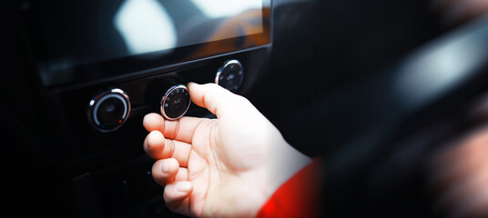 The process of choosing climate control in the car. Various controls in auto switches. Modern car...