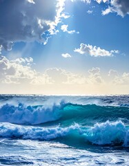 Turquoise ocean waves under a bright sun and cloudy sky