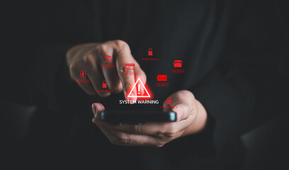Smartphone showing red system warning alert, concept of cyber attack, malware infection, hacking, data breach, and online security threat in digital technology and network systems.