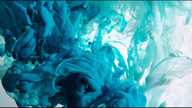 Abstract Blue and White Ink in Water Forming Artistic Shapes.