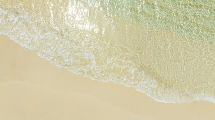 Nature of the ocean and blue sky Summer with sunshine, sandy beaches, clear blue waters sparkling against the blue sky. on an island with good ecology and environment Background for summer vacation