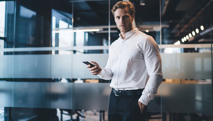businessman using smartphone in the city