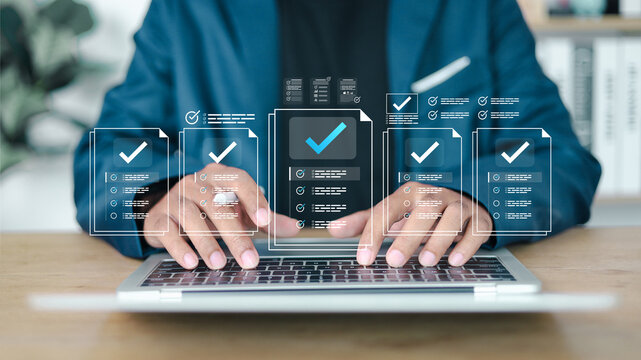 Businessman showing online document validation icon, quality assessment management With a checklist, business document evaluation process.