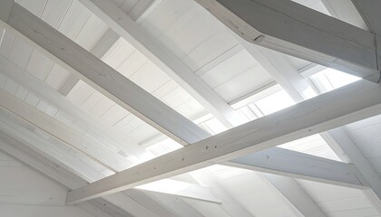 Architectural interior view of a white ceiling with wooden beams and natural light