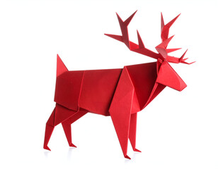 A geometric red origami reindeer stag with intricate antlers, a beautiful example of Japanese paper folding art, isolated on a white background