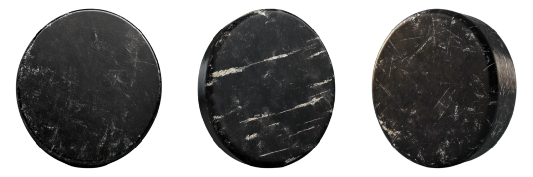 Three Hockey Pucks in different angles 