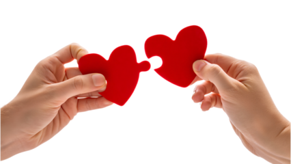Two hands connecting two red heart shaped puzzle pieces isolated on transparent background