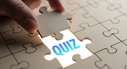 Fototapeta premium Puzzle piece revealing word quiz jigsaw hand